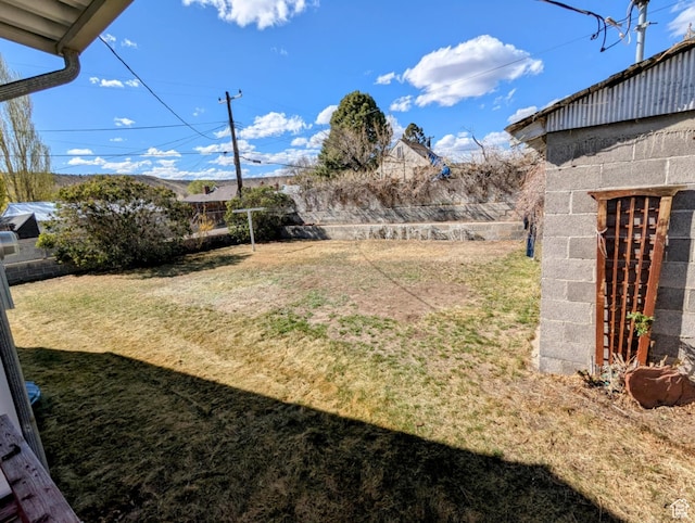 view of yard featuring fence