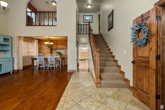 892 S Cambridge Dr, St George, UT 84770 - entrance foyer featuring baseboards, stairs, and a towering ceiling