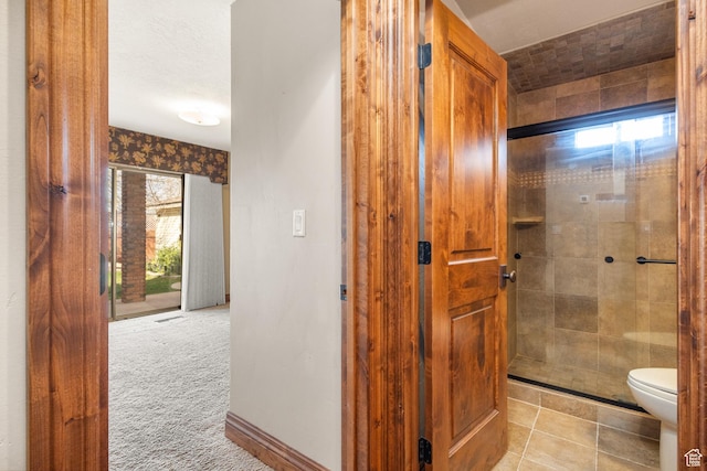 892 S Cambridge Dr, St George, UT 84770 - full bathroom with toilet, a tile shower, and tile patterned floors