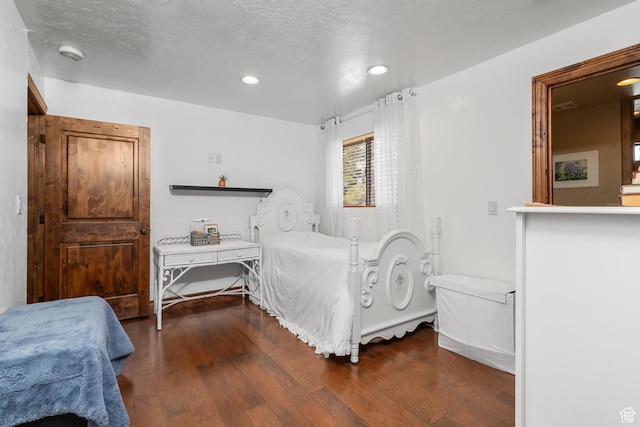 892 S Cambridge Dr, St George, UT 84770 - bedroom with wood finished floors and recessed lighting