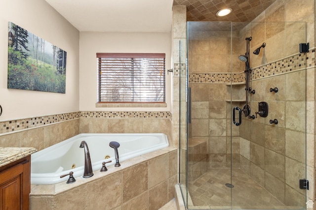 892 S Cambridge Dr, St George, UT 84770 - full bath with a tub with jets, a stall shower, and vanity