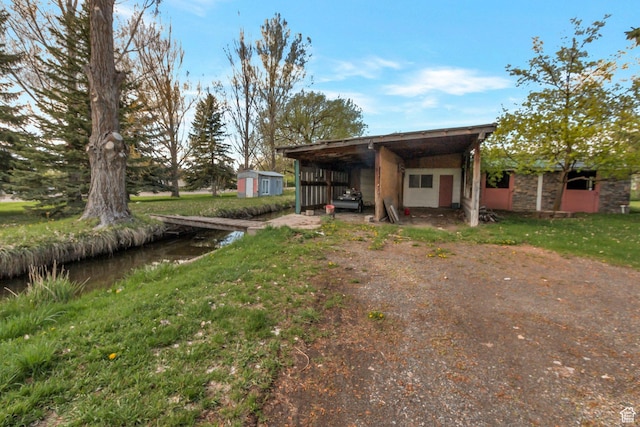 175 W 9200 S, Paradise, UT 84328 - view of front of house featuring an outbuilding and a shed