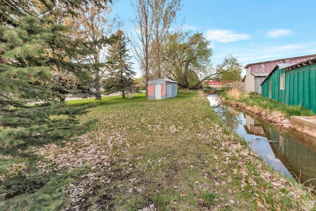 175 W 9200 S, Paradise, UT 84328 - view of yard with a storage shed and an outbuilding