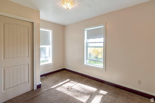 175 W 9200 S, Paradise, UT 84328 - unfurnished bedroom with baseboards, multiple windows, and carpet