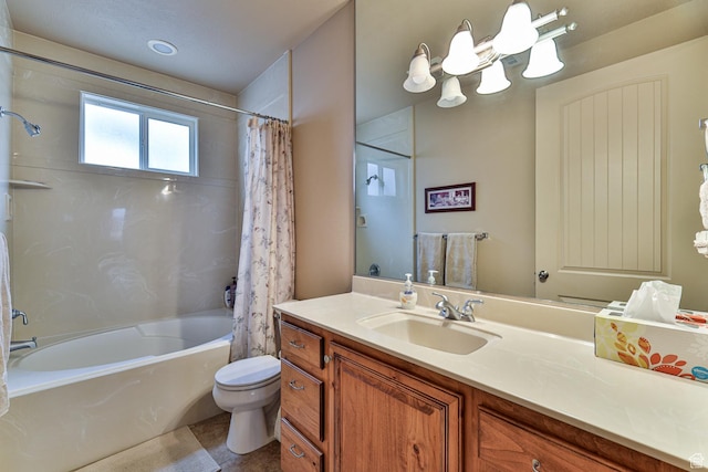 full bathroom featuring toilet, shower / tub combo with curtain, and vanity