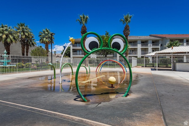 view of play area with fence