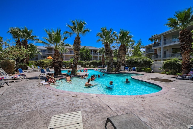 community pool featuring a patio