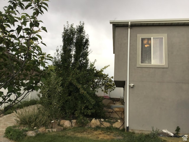 view of property exterior with stucco siding