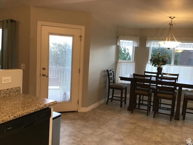 dining room featuring baseboards