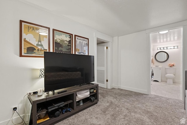 725 E Three Fountains Cir S Unit 60, Murray, UT 84107 - living room featuring carpet floors, washer / clothes dryer, and baseboards