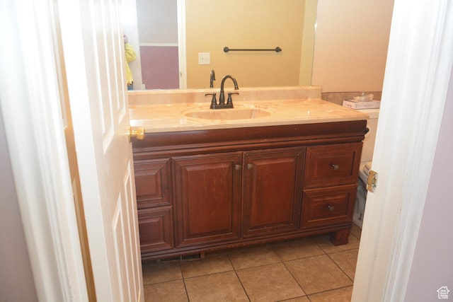 bathroom featuring tile patterned floors, visible vents, and vanity