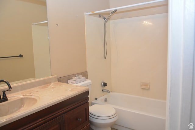 full bath with  shower combination, toilet, and vanity