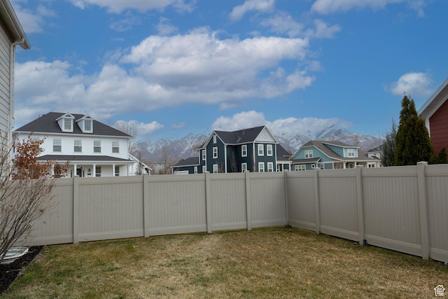 417 N Hill Farms Ln, Kaysville, UT 84037 - view of yard featuring a fenced backyard, a residential view, and a mountain view