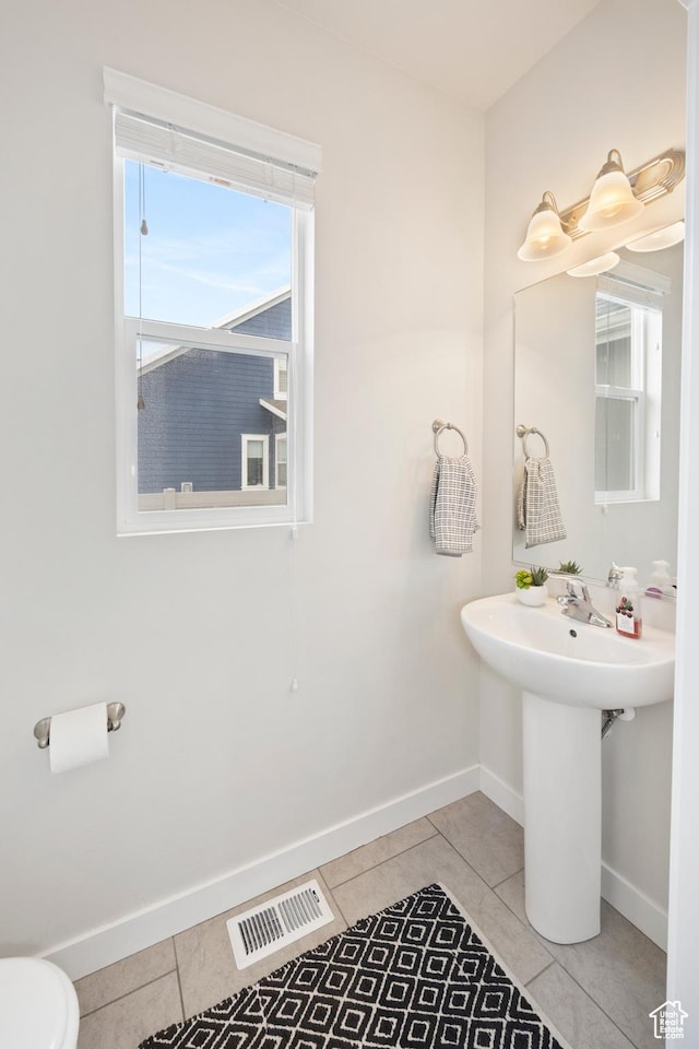 417 N Hill Farms Ln, Kaysville, UT 84037 - half bath featuring baseboards, toilet, visible vents, and tile patterned floors