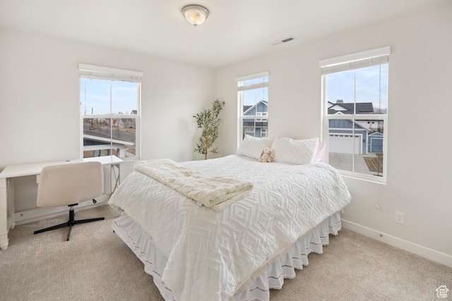 417 N Hill Farms Ln, Kaysville, UT 84037 - bedroom featuring light colored carpet, visible vents, and baseboards