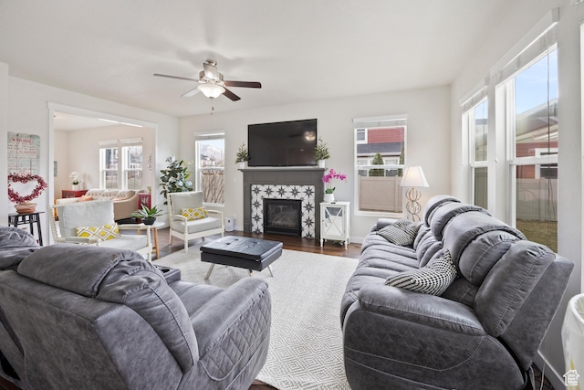 417 N Hill Farms Ln, Kaysville, UT 84037 - living room featuring ceiling fan, a fireplace, baseboards, and wood finished floors