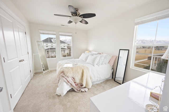 417 N Hill Farms Ln, Kaysville, UT 84037 - bedroom featuring ceiling fan, visible vents, and light colored carpet