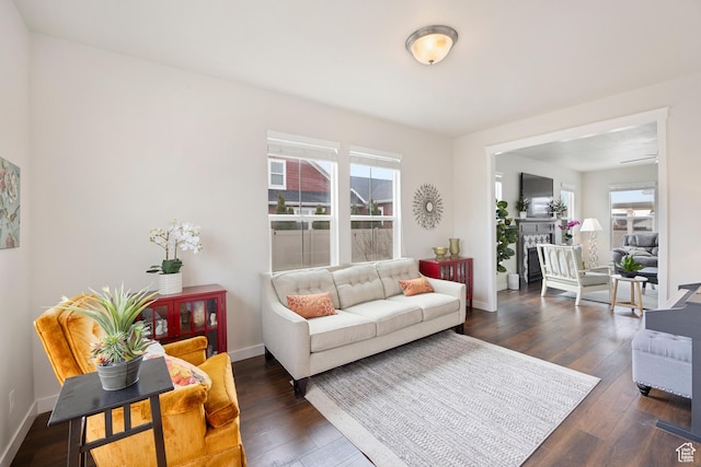 417 N Hill Farms Ln, Kaysville, UT 84037 - living area featuring wood-type flooring, a fireplace, and baseboards