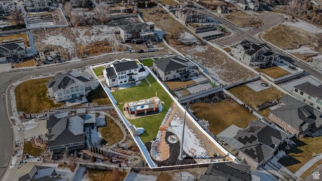 birds eye view of property with a residential view