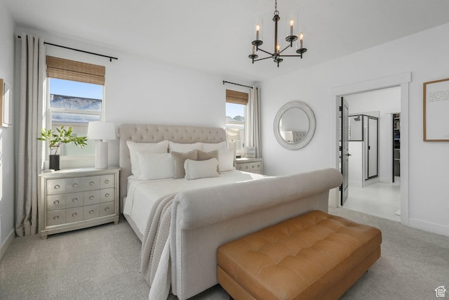 bedroom with an inviting chandelier, baseboards, and carpet