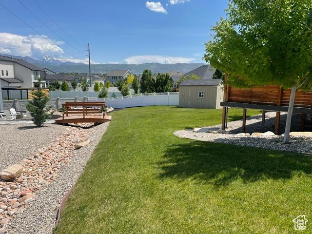 11619 S Halcom Dr, South Jordan, UT 84095 - view of yard with a mountain view