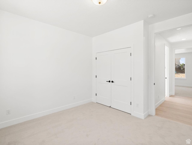 2387 E Canyon Crest Dr Unit 44, Spanish Fork, UT 84660 - unfurnished bedroom with light colored carpet and a closet