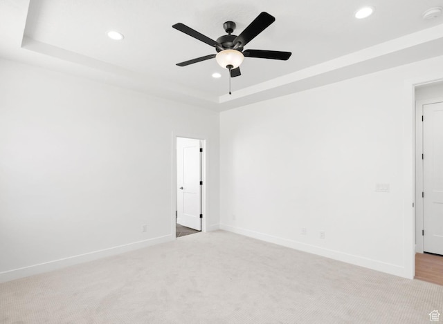 2387 E Canyon Crest Dr Unit 44, Spanish Fork, UT 84660 - empty room with recessed lighting, a tray ceiling, a smoke detector, light colored carpet, and a ceiling fan