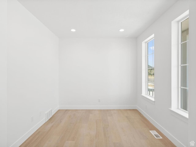 2387 E Canyon Crest Dr Unit 44, Spanish Fork, UT 84660 - unfurnished room featuring light wood-type flooring, plenty of natural light, and recessed lighting