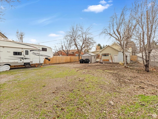 155 E 100 S, Payson, UT 84651 - view of yard featuring an outdoor structure, fence, and a shed