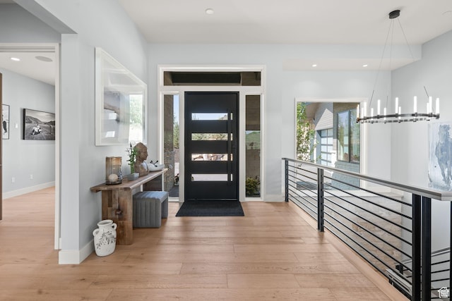 2344 Nighthawk Cir, Park City, UT 84098 - entrance foyer with baseboards, recessed lighting, wood finished floors, and a notable chandelier