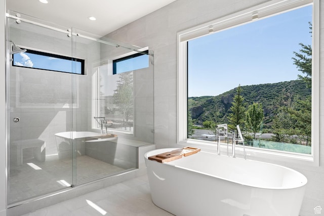 2344 Nighthawk Cir, Park City, UT 84098 - bathroom featuring a stall shower, recessed lighting, and a soaking tub