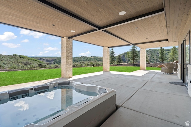 2344 Nighthawk Cir, Park City, UT 84098 - view of patio featuring a wooded view and a hot tub