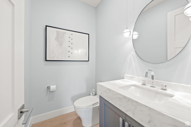 2344 Nighthawk Cir, Park City, UT 84098 - half bath featuring vanity, wood finished floors, toilet, and baseboards
