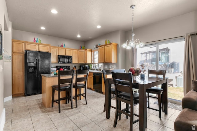 2616 N Elm Dr, Lehi, UT 84043 - kitchen featuring a chandelier, black appliances, light tile patterned floors, and a kitchen island