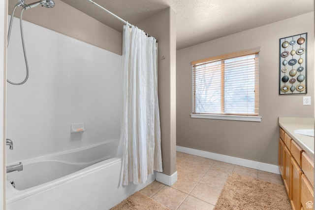 2616 N Elm Dr, Lehi, UT 84043 - bathroom with baseboards, shower / tub combo with curtain, tile patterned flooring, a textured ceiling, and vanity