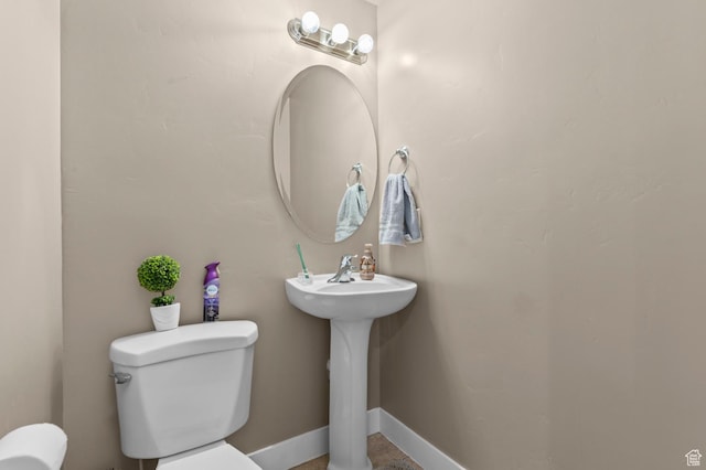 2616 N Elm Dr, Lehi, UT 84043 - half bathroom featuring baseboards and toilet
