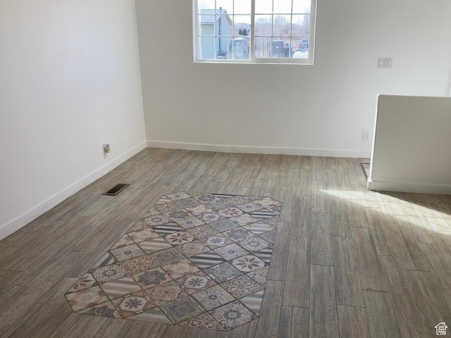 2245 W 500 S, Vernal, UT 84078 - empty room with visible vents, baseboards, and wood finished floors