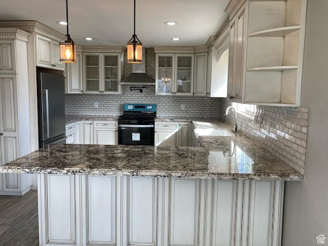 2245 W 500 S, Vernal, UT 84078 - kitchen featuring electric stove, glass insert cabinets, a peninsula, fridge, and a sink