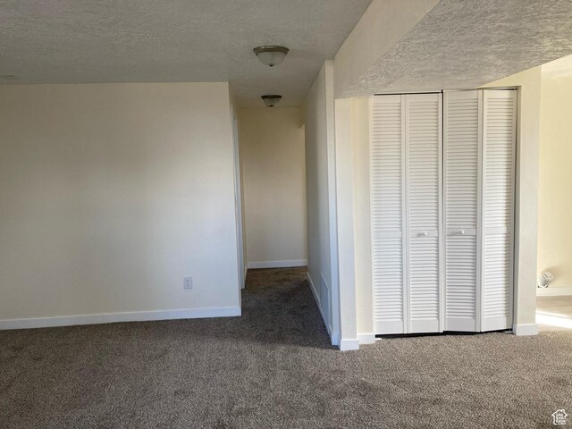2245 W 500 S, Vernal, UT 84078 - hallway with carpet floors, baseboards, and a textured ceiling