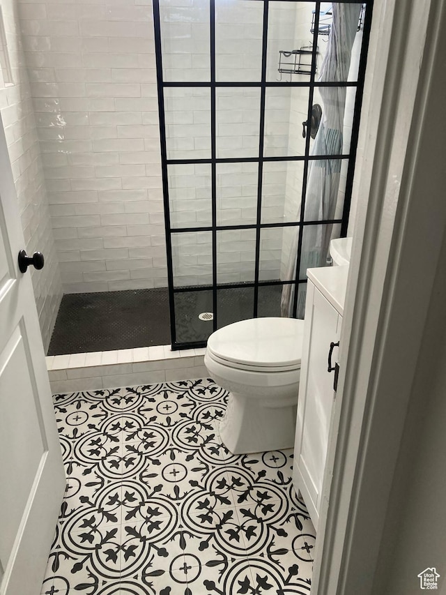 2245 W 500 S, Vernal, UT 84078 - bathroom featuring tile patterned flooring, vanity, toilet, and walk in shower