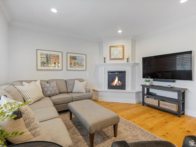 4823 S Brooks Way, Holladay, UT 84117 - living room featuring crown molding, wood finished floors, recessed lighting, and a glass covered fireplace