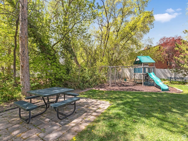 4823 S Brooks Way, Holladay, UT 84117 - view of green lawn featuring a playground and outdoor dining area