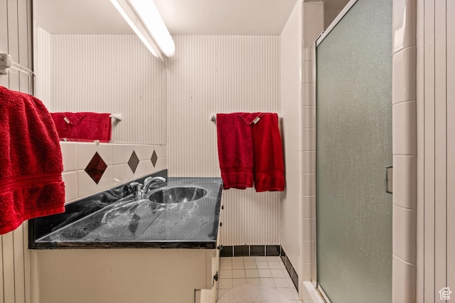 3604 S Crestwood Dr, Salt Lake City, UT 84109 - full bathroom featuring a stall shower, tile patterned flooring, vanity, and decorative backsplash