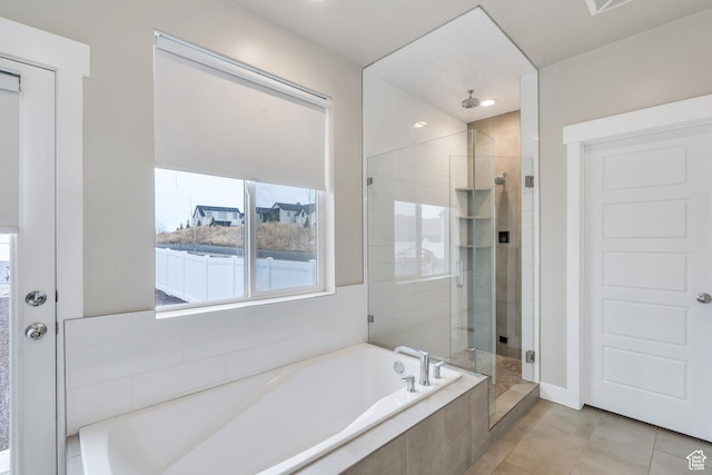 1407 E Abigail Ln, Eagle Mountain, UT 84005 - bathroom with tile patterned flooring, visible vents, a garden tub, and a shower stall