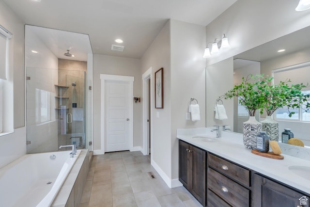 1407 E Abigail Ln, Eagle Mountain, UT 84005 - bathroom featuring double vanity, a garden tub, a shower stall, and a sink