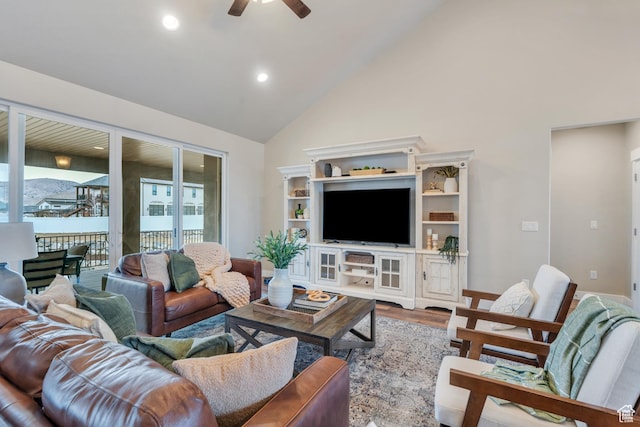 1407 E Abigail Ln, Eagle Mountain, UT 84005 - living area featuring ceiling fan, high vaulted ceiling, recessed lighting, wood finished floors, and baseboards