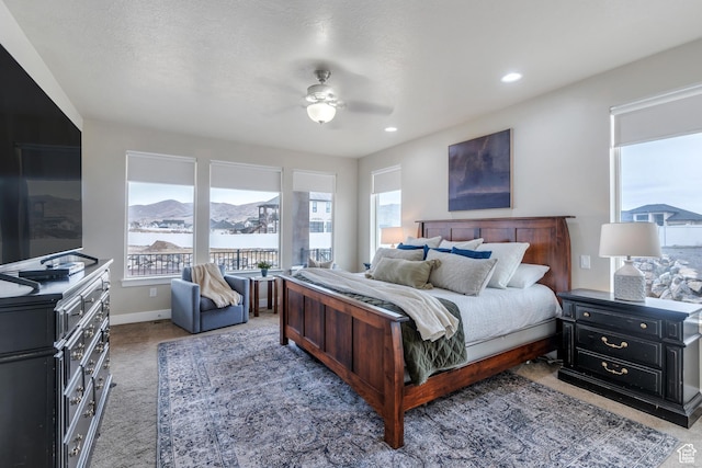 1407 E Abigail Ln, Eagle Mountain, UT 84005 - bedroom with ceiling fan, a mountain view, recessed lighting, carpet flooring, and baseboards