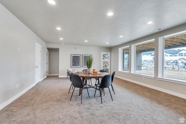 1407 E Abigail Ln, Eagle Mountain, UT 84005 - dining room featuring recessed lighting, carpet flooring, visible vents, and baseboards