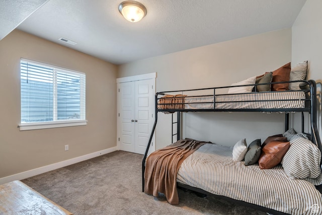 1407 E Abigail Ln, Eagle Mountain, UT 84005 - bedroom featuring carpet, a closet, visible vents, and baseboards