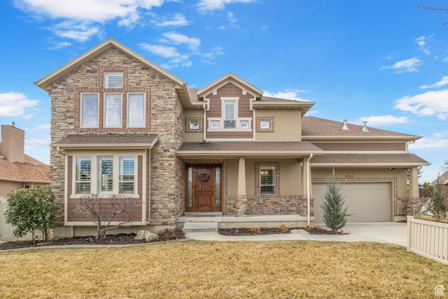 view of front of home featuring stone siding, concrete driveway, and a front yard